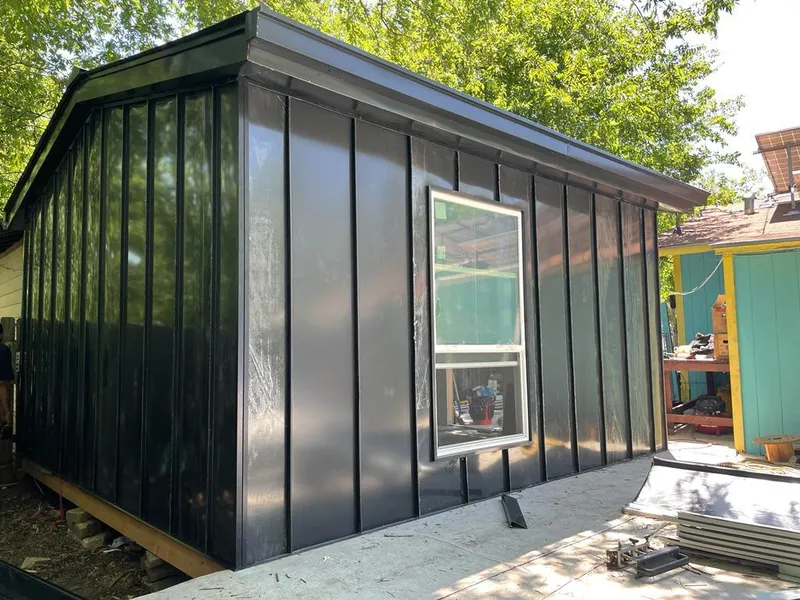 Black standing seam metal wall panels for Roof Inspection in Smyrna